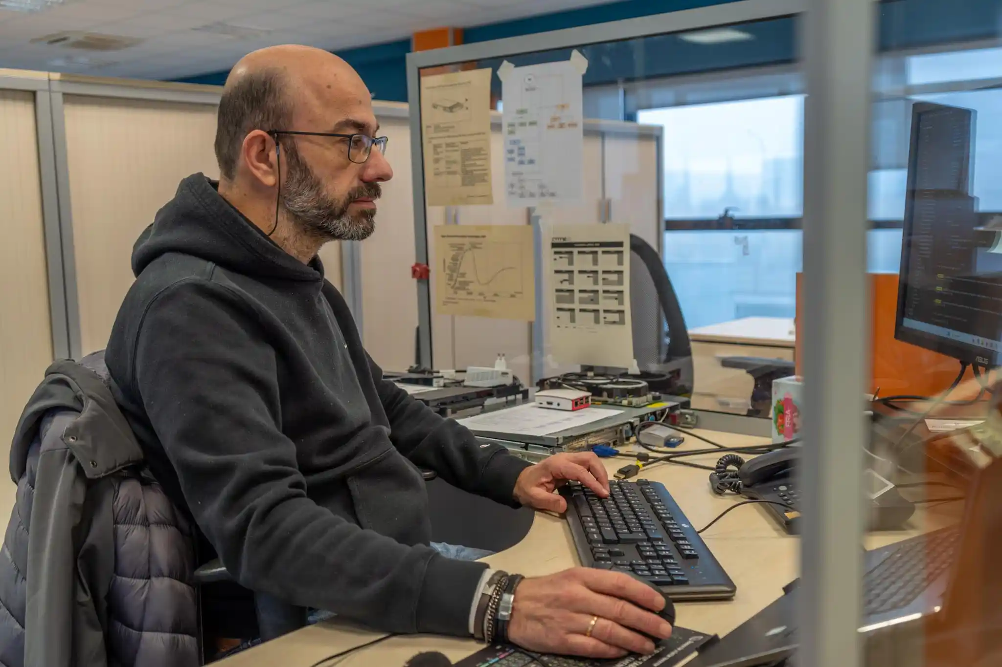 Technician specialising in digital innovation working in a technology laboratory